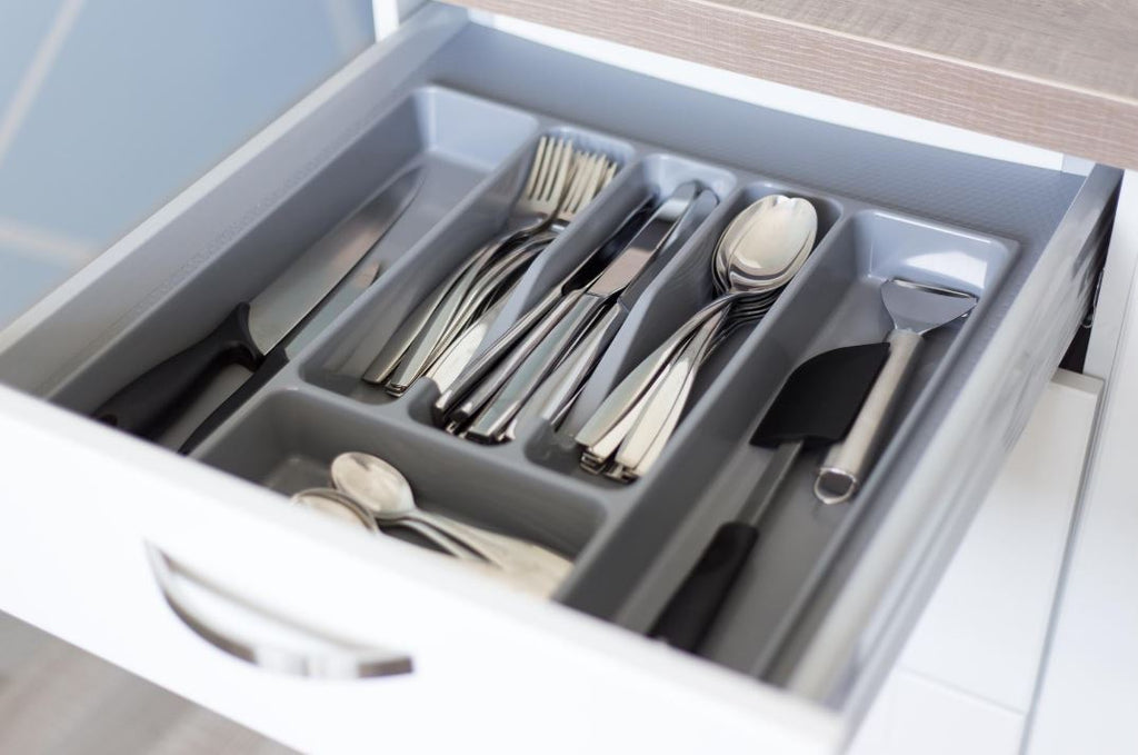 Kitchen drawer interior under control! Organizers will keep your drawer orderly